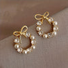Elegant Minimalist Butterfly Knot Designed Pearl Earrings